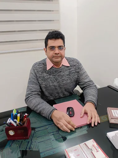 Dr. Vinay Tak