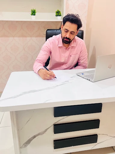 Dr. Manjinder Singh